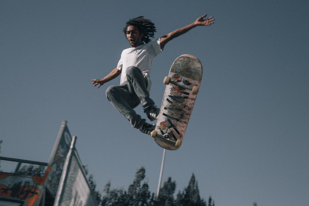 man on skateboard in air