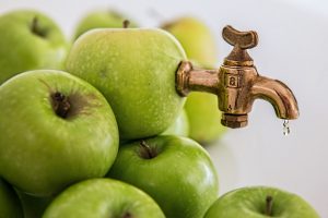amount of green apples with a tap