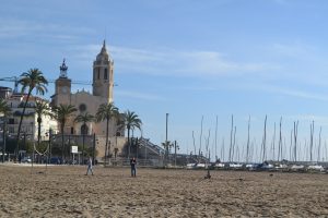 beach in sitges with church 