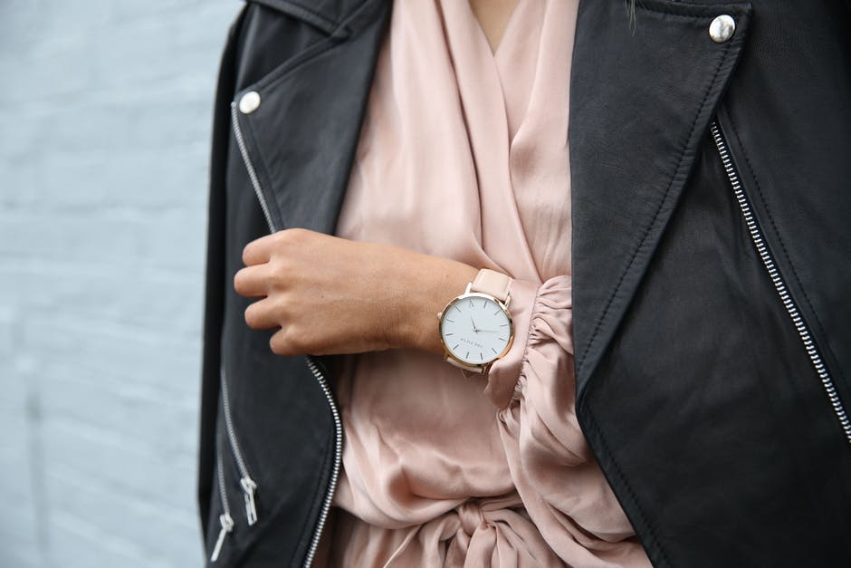 watch and pink dress with black jacket