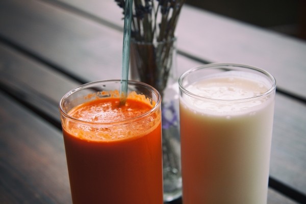 glass of milk and carrot juice