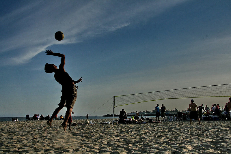 people playing beach volleyball