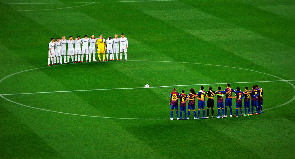 players on the field of camp nou