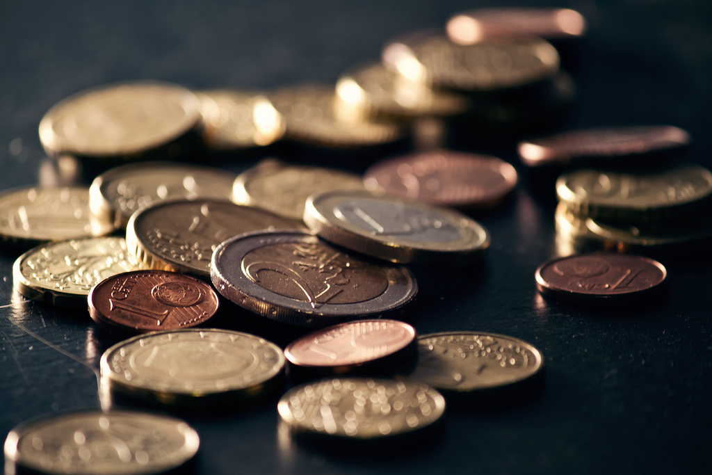 Coins on a black table