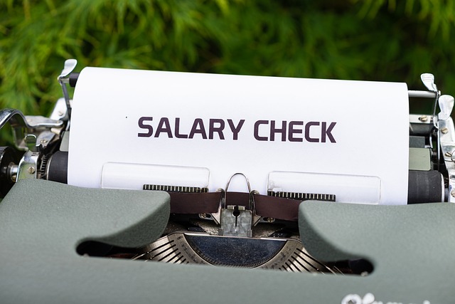 typewriter with salary