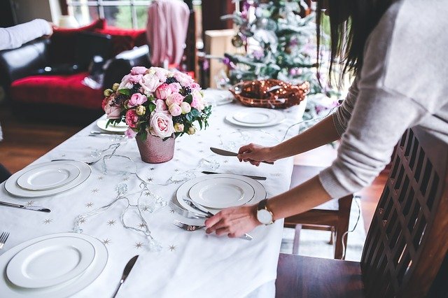 christmas table being set