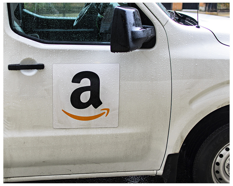 car with amazon logo on door