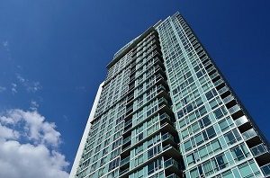 tall apartment building and blue sky