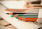 colouring pencils on desk