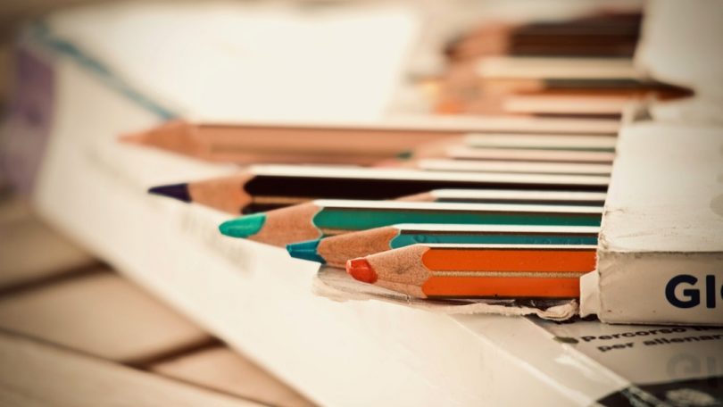 colouring pencils on desk