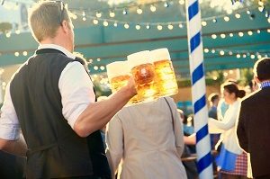 waiter bringing beer at oktoberfest