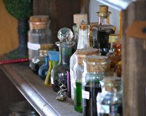 several potions in glass bottles