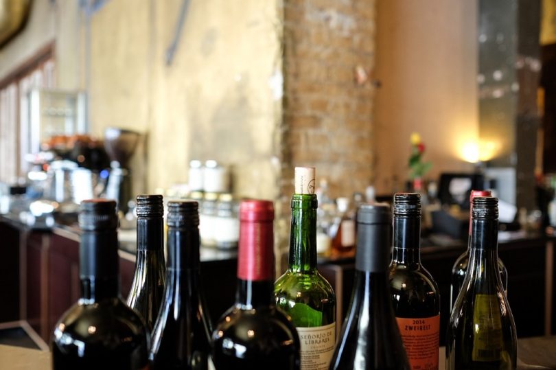 wine bottles on bar