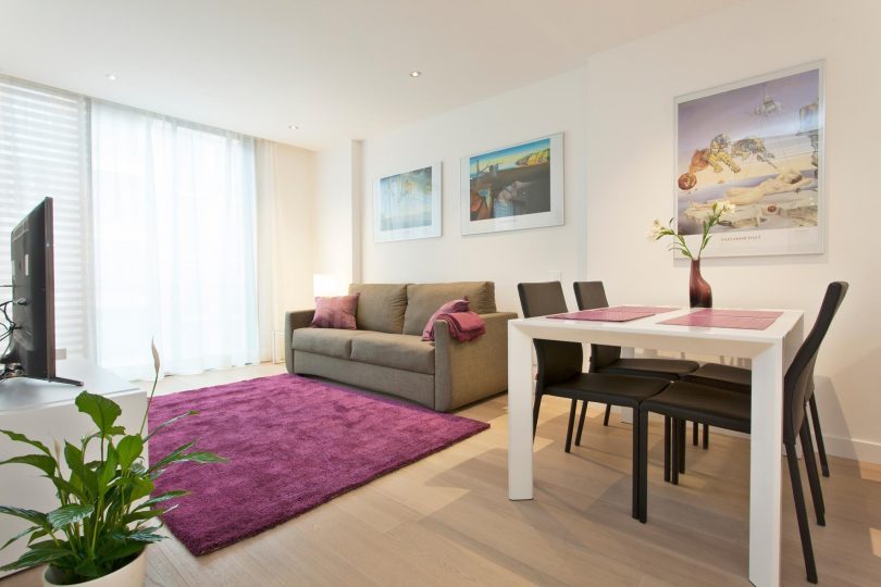 living room with purple carpet