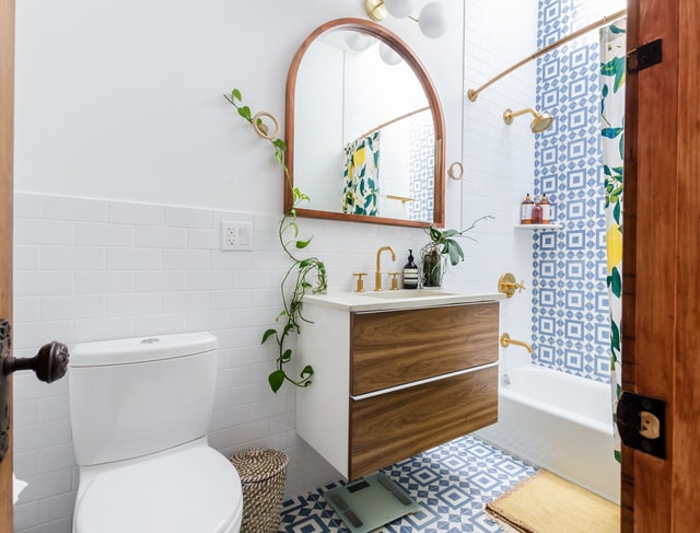 bathroom with white, wood and blue