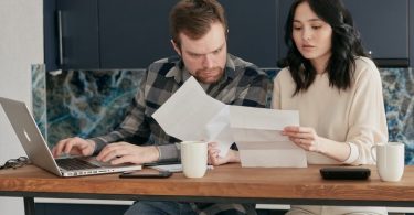couple looking at papers