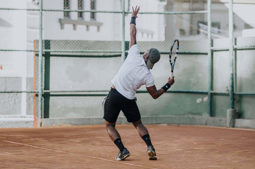 tennis player serving the ball