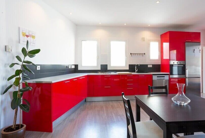 best floor for the kitchen - red kitchen with wooden floor