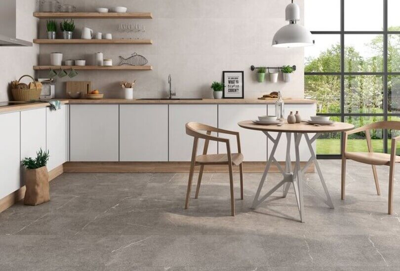 Kitchen with natural stone floor in grey