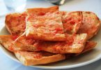 pan tumaca on a plate