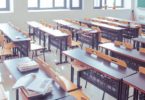 classroom filled with tables and chairs