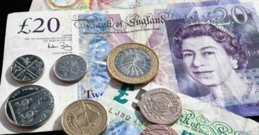 20 pound bill and euros coins