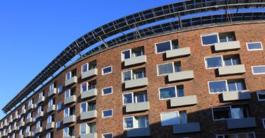 apartment building with blue sky