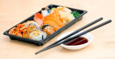 sushi with chop sticks and soya sauce