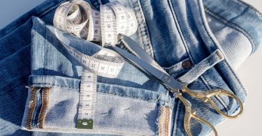 jeans, scissors and measure tape