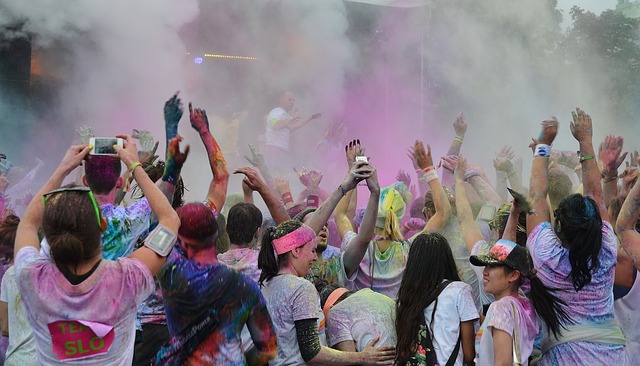 group covered in coloured powder