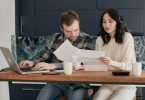 couple looking at papers